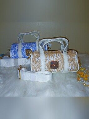 2 Purses XOXO Tan & Blue Monogram Barrel Bags with Gold Plate And Purse Charms